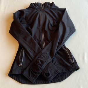 Athleta Black running jacket with reflective material